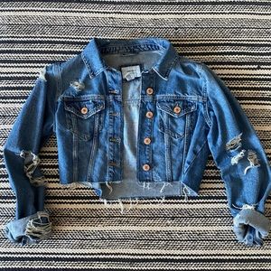 Ripped denim jacket